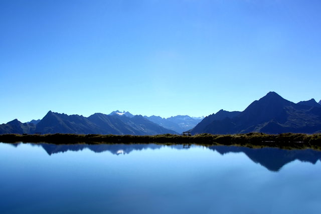 Speichersee am Penkenjoch mit Zillertaler Bergkulisse