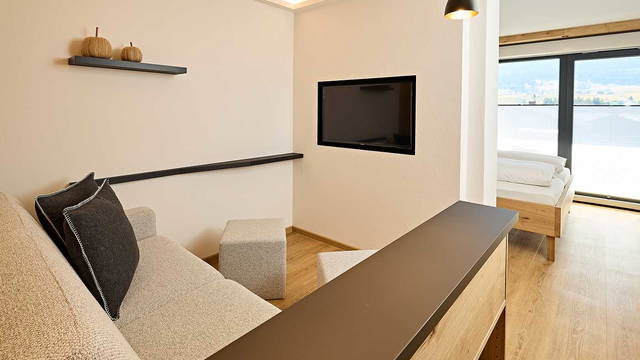 Wohn- und Schlafbereich im Doppelzimmer Besler