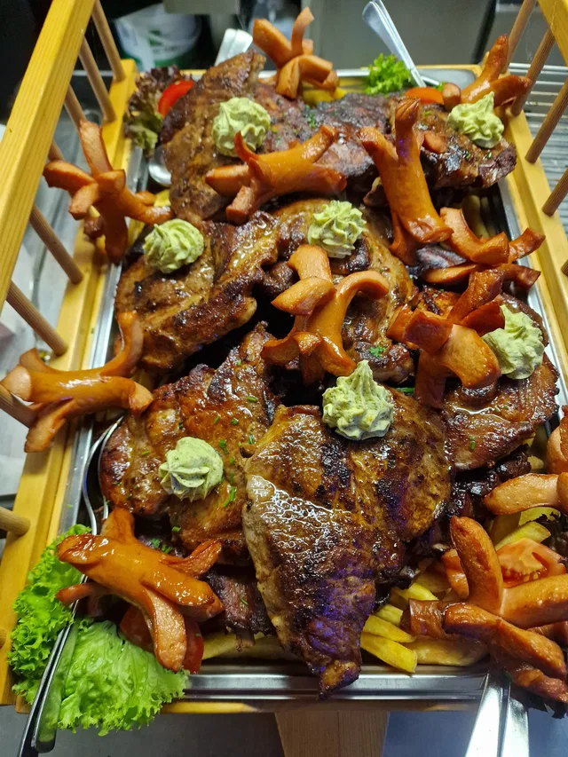 Gegrilltes Fleischgericht im Gasthof Alpenblick am Grünten