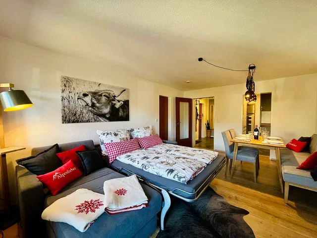 Ausgezogenes Schlafsofa in Alpenfieber I